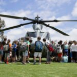 hmla 775 showcases their uh 1n "huey" and ah 1 "cobra" attack helicopters to the staff and students of calavera hills middle school