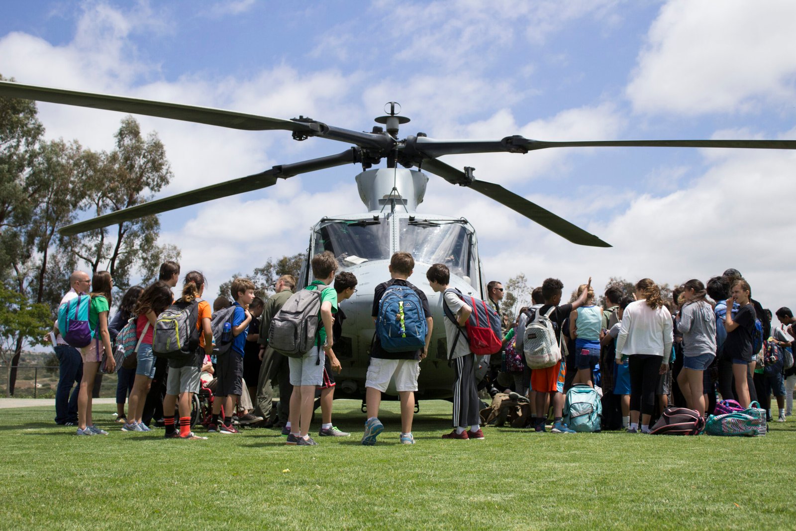 hmla 775 showcases their uh 1n "huey" and ah 1 "cobra" attack helicopters to the staff and students of calavera hills middle school